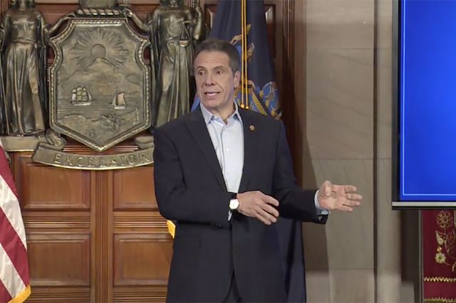 Governor Andrew Cuomo at his April 11, 2020 press conference, standing and gesturing